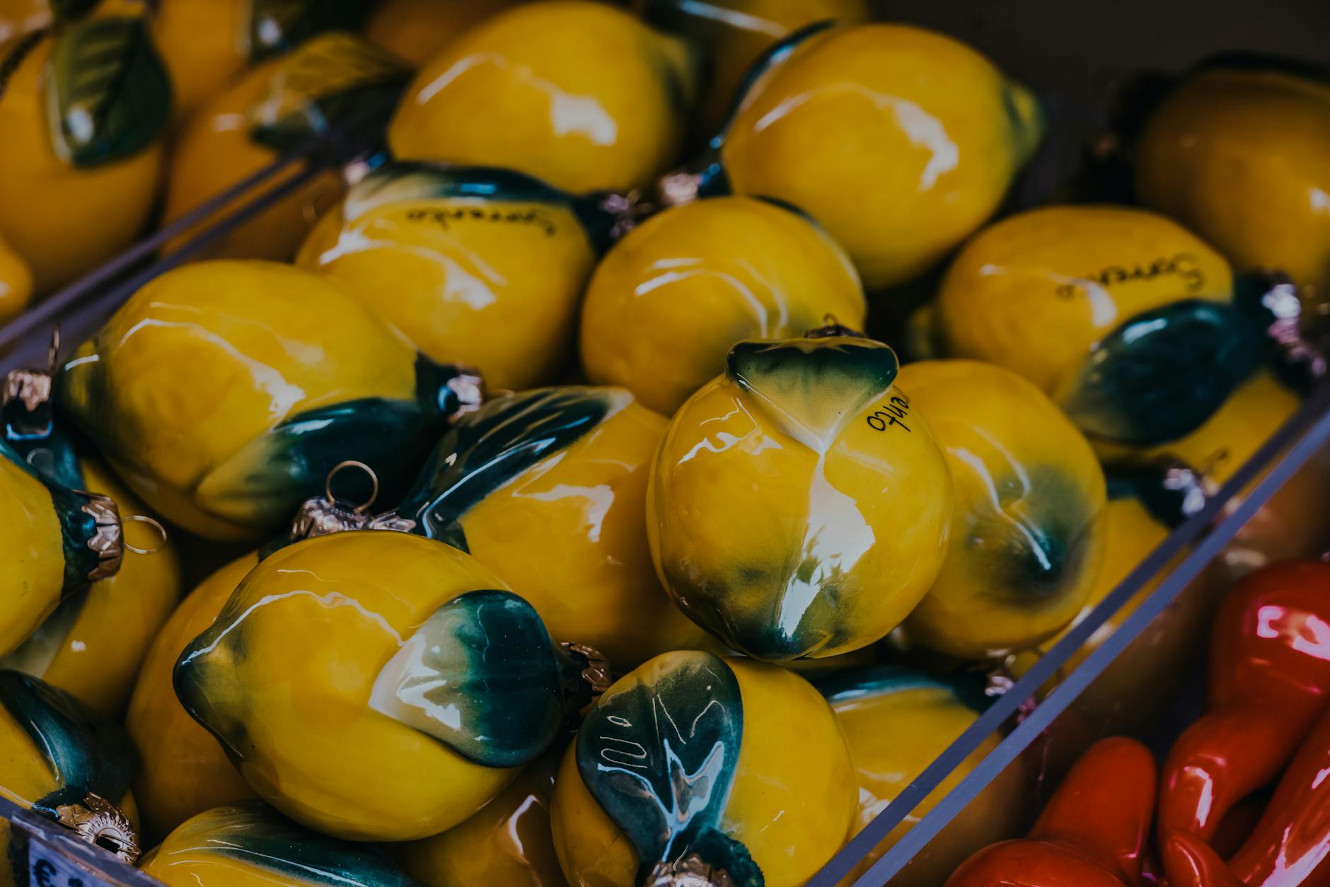 Vibrant yellow ceramic lemons artfully displayed, symbolizing fresh approaches to pleasure and sensation