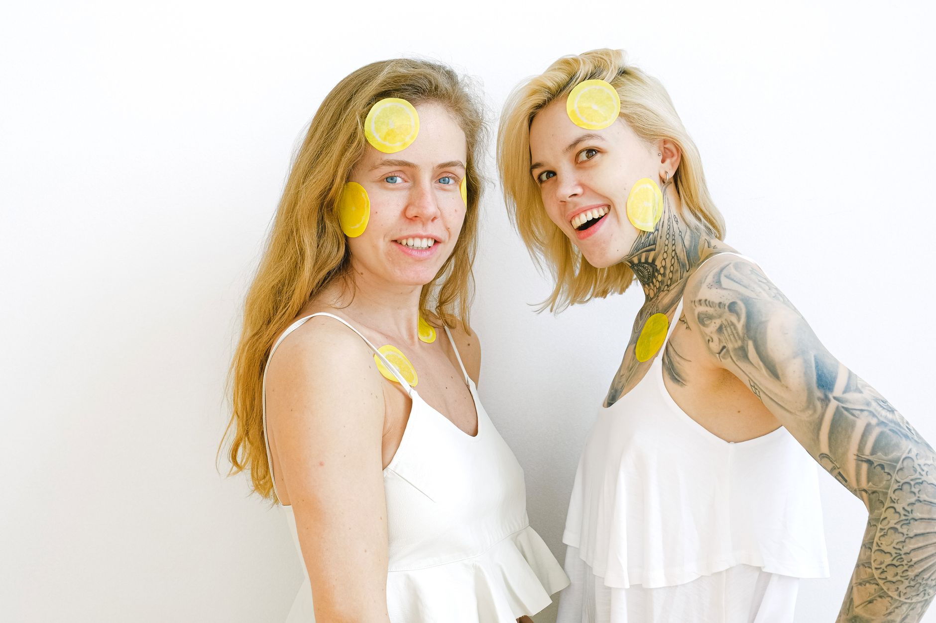 Two vibrant lemons against a minimalistic white background, symbolizing fresh approaches to rebuilding sensation.